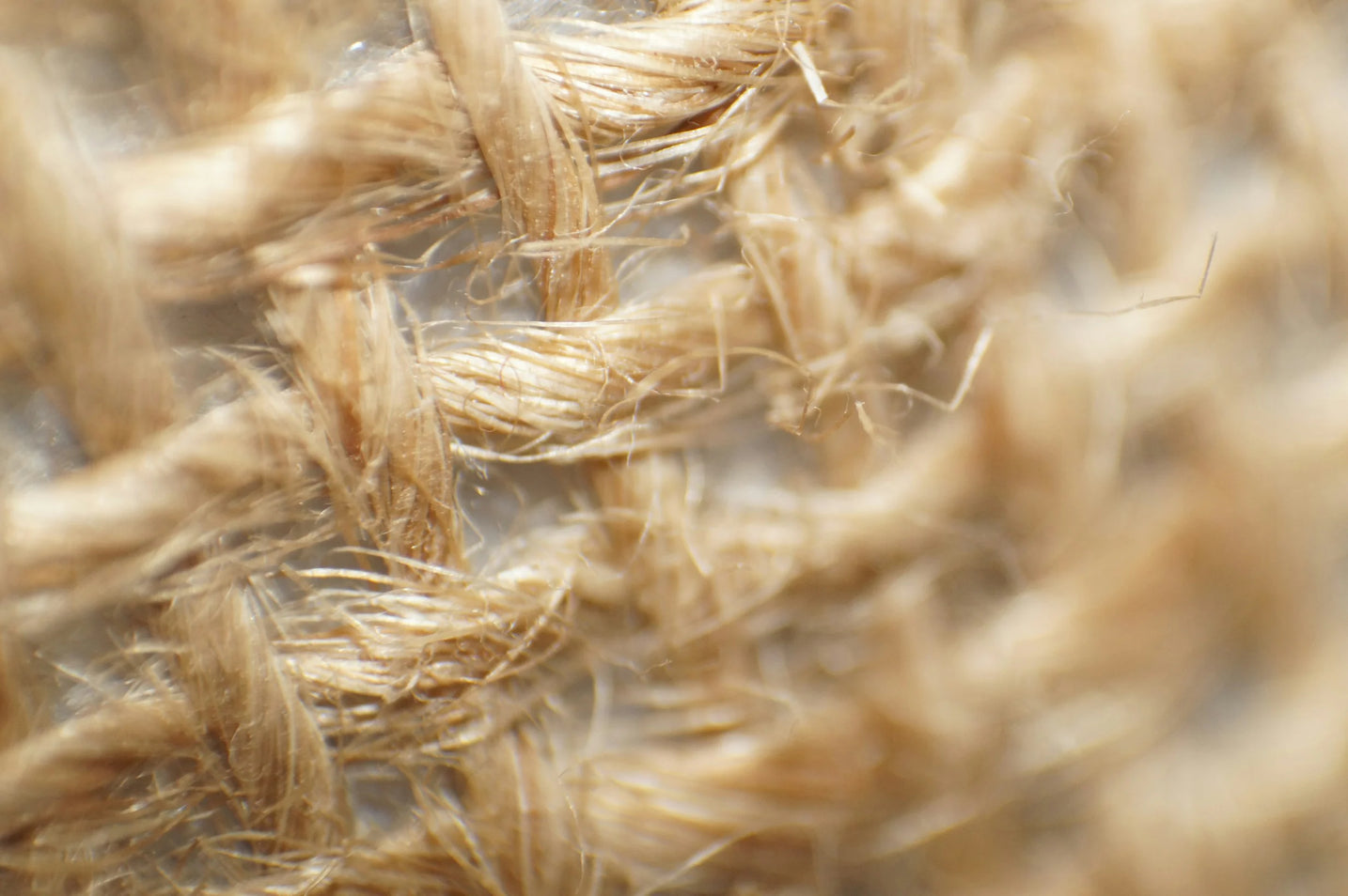 A maker presses a hemp-cotton blend shirt.