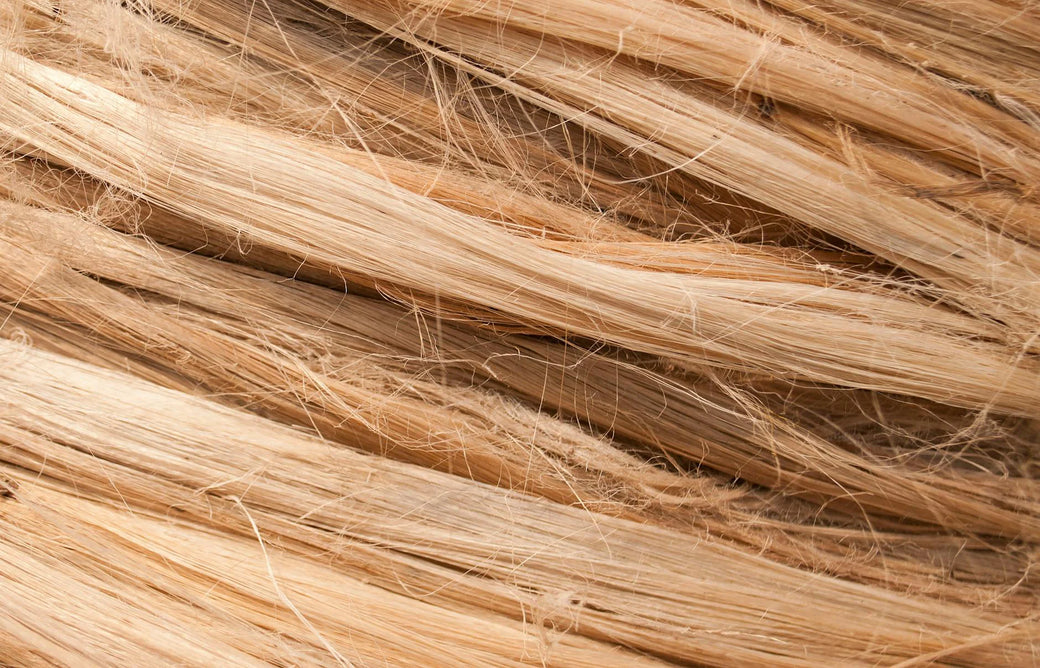 A close-up of woven linen threads.